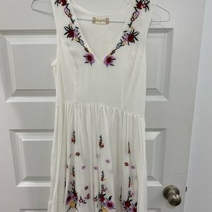 White dress with floral accents